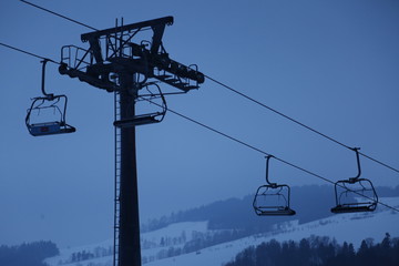 Chairlift in the evening during winter. The Sudety Mountains