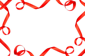 Frame made from red satin ribbons isolated on white background with clipping path and copy space in the middle.