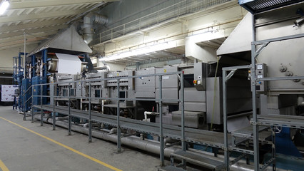 Weaving machines of the cotton factories. Production of textiles.