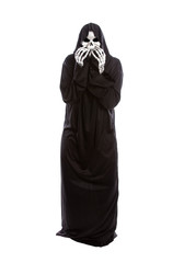 Halloween costume of a skeleton grim reaper wearing a black robe on a white background acting...