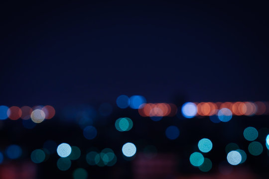 Blurred light night city bokeh abstract background