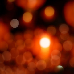 Red background blurred light christmas holiday pattern. Abstract decoration bokeh gllitter xmas and new year or valentine festive.