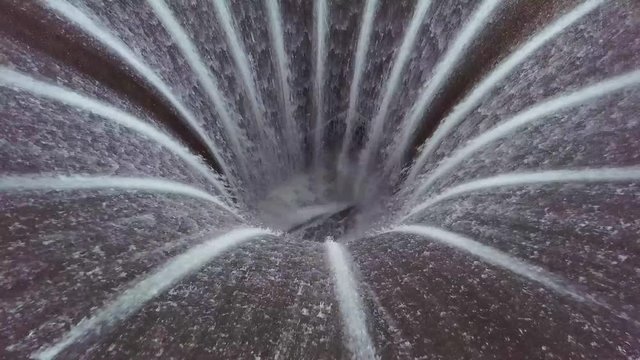 Rushing water flowing down through the impressive Gleann Dubh Reservoir near Barcaldine, Scotland