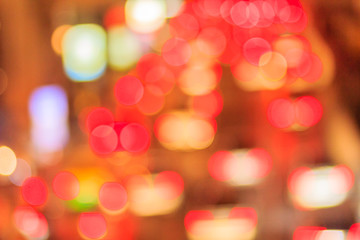 Fototapeta premium Abstract blur of Evening traffic jam on road in city. Out of focus lights from cars in a traffic jam. lights car traffic jam of a street road at night. Road traffic jam night,blur focus