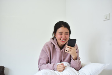 Fototapeta premium Women holding and using mobile smart phone for shopping on line by internet technology