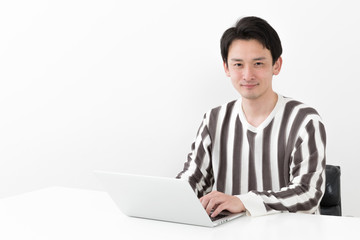Fototapeta na wymiar portrait of casual asian man on white background