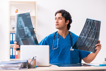 Young male doctor radiologist working at the clinic