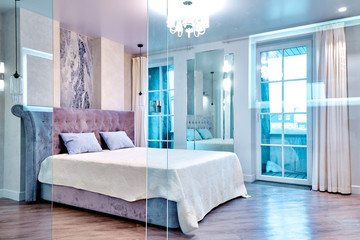 Big comfortable double bed in elegant luxary bedroom