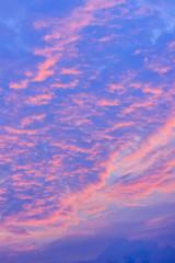 Colorful with red, orange and blue dramatic sky on the clouds for abstract background. Romantic sunset background with beautiful blue, red and yellow clouds.