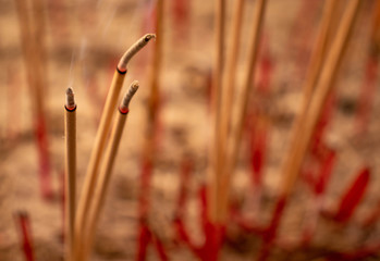 Close up of blurred incense with smoke for background with blank space for text.