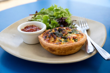 Quiche with vegetables and sauce