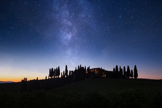 Milky Way Galaxy and Tuscany landscape