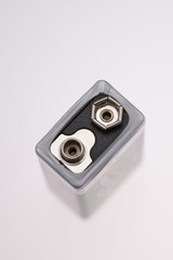 Nine-volt battery. 9V