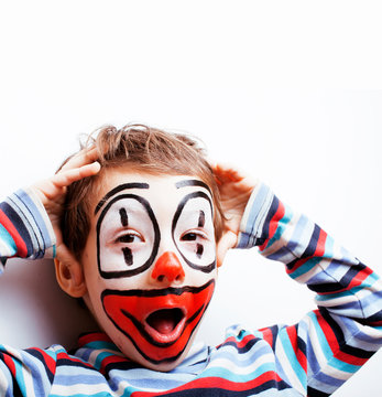 little cute boy with facepaint like clown, pantomimic expressions close up