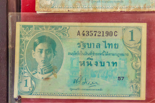 Old Thai one Baht banknotes with king Ananda Mahidol image since word war ii period for people who like to collect antique object. Vintage Thai King Ananda Mahidol banknotes collection.