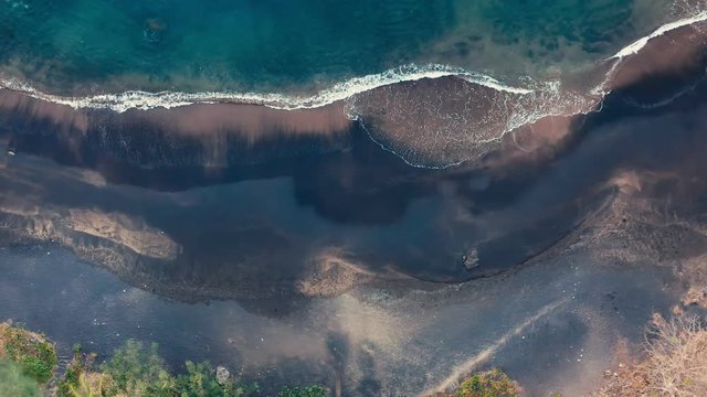 Aerial view of a deserted Black Sand beach in Costa Rica