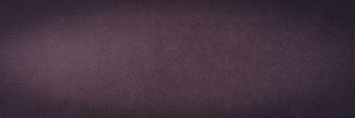Background wall of aged textured old plaster purple.