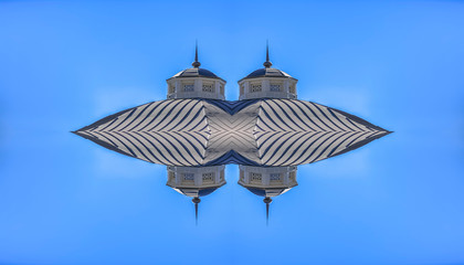 Abstract roof of hut shaped building reflection