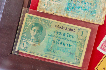 Old Thai one Baht banknotes with king Ananda Mahidol image since word war ii period for people who like to collect antique object. Vintage Thai King Ananda Mahidol banknotes collection.