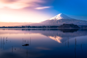 Fuji mountain in the morning twilight sky and reflection on the lake kawakuchiko