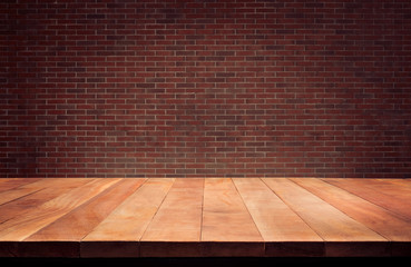 Empty wood table top with Brown brick wall background.For create product display or design key visual