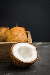 Fresh coconuts on the rustic background. Selective focus. Shallow depth of field.