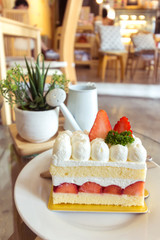 The strawberry shortcake is placed in a beautifully prepared dish.