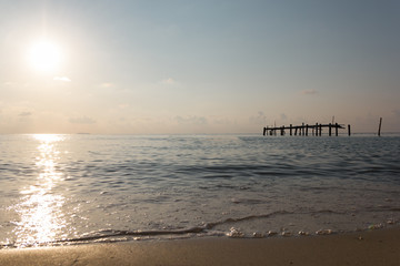 Wooen jetty was abandoned. Located by the beach Stretching into the sea.