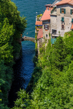 Old town with fallen Nesso Come lake