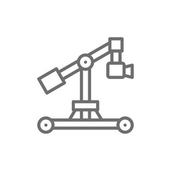 Digital movie camera on dolly rails line icon.