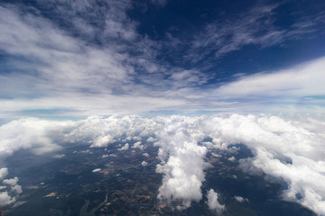 Fototapeta na wymiar Clound and Sky View from airplane 's window.