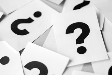 Cards with a big question mark.