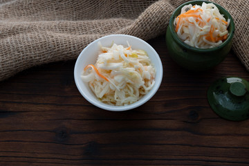 Home sauerkraut, sauerkraut and carrots, a traditional national dish in Russia, Poland, Germany. Copy space.