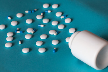  Pills on a bright blue background. Health. Medicine