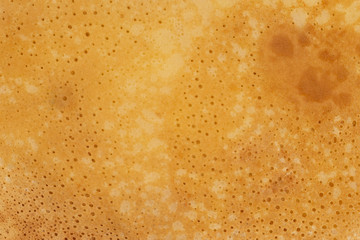 Pancake symbol of spring and sun texture background.