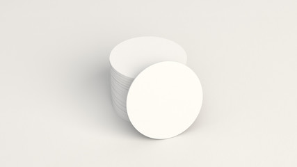 Mockup of blank white round beer coasters