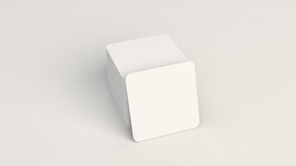 Mockup of blank white square beer coasters