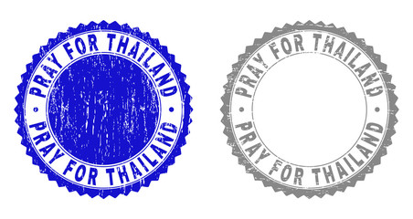 Grunge PRAY FOR THAILAND stamp seals isolated on a white background. Rosette seals with grunge texture in blue and grey colors.