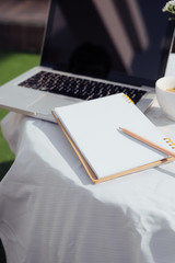 Laptop, bread and cafe in coffee shop