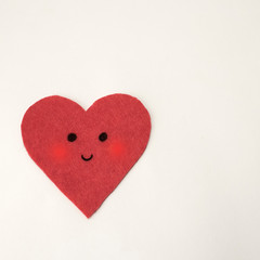 Kawaii heart for valentines day and for design on white backgraund.made of felt
