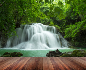 Wood platform beside the waterfall