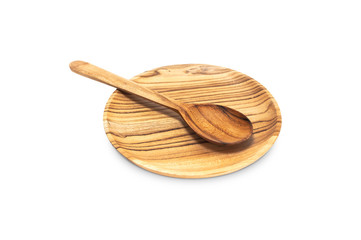 Empty round wooden plate, spoon isolated on white background top view. Handcrafted cooking...