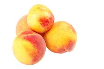 Fresh peach fruits isolated on white background