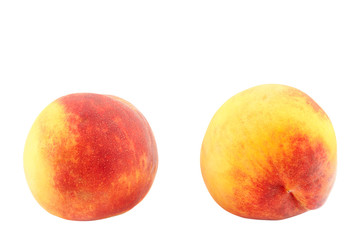 Fresh peach fruits isolated on white background
