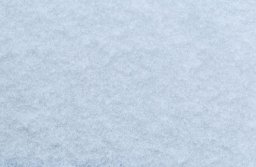 Obraz premium background of fresh snow texture in blue tone