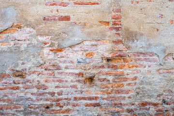 Cracked concrete vintage wall background, old brick wall