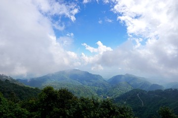 Naklejka premium Beautiful landscape on mountain with sky and cloud, peace and relaxation, pictured from Space for text in template