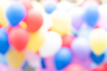 Blur colorful party balloons for background. Bright abstract background.