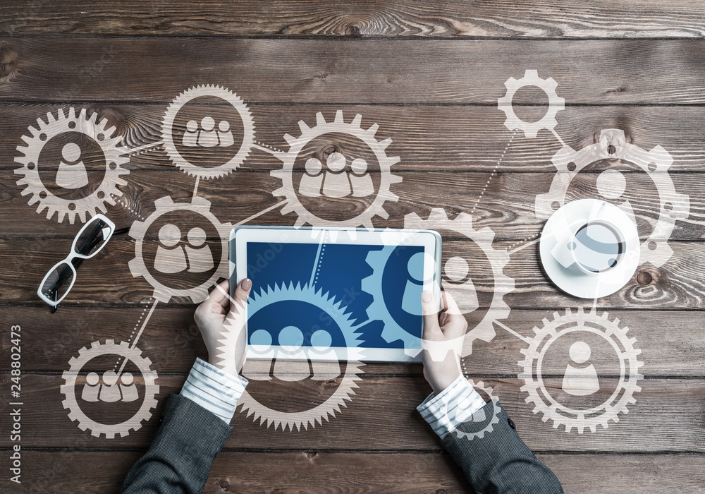 Poster concept of teamworking and connection with gears mechanism and tablet pc