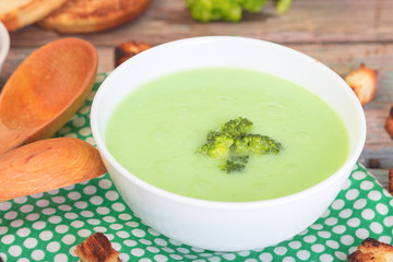 Bowl of cream of broccoli soup. Concept of healthy eating or vegetarian food